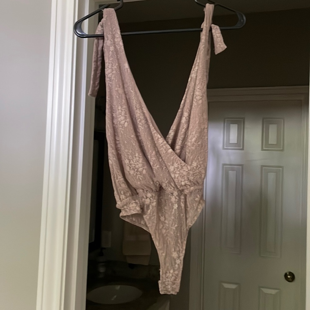 Free People Deep cut body suit.